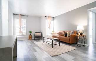 a living room with a couch and a table
