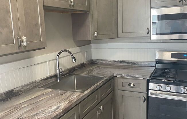 40 Rowley St. aka w/City: 54 Harvard St