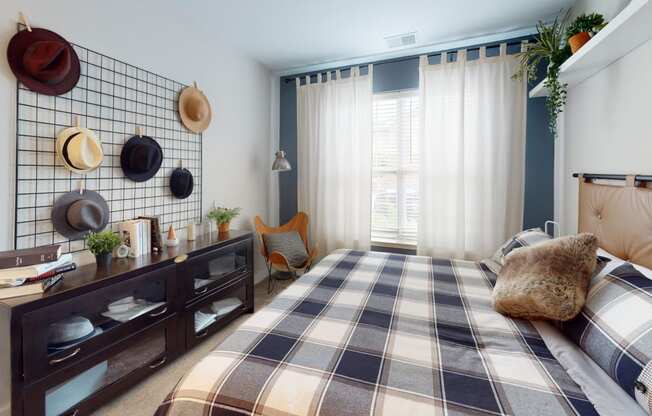 a bedroom with a bed in a room at The Bend Arbordale, Virginia