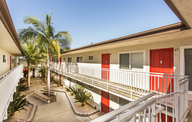 Pacific Sands walkway with tropical landscaping at Pacific Sands, San Diego, CA, 92117