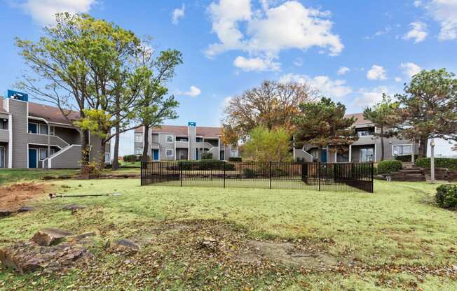 the preserve at ballantyne commons yard with fence and apartment buildings