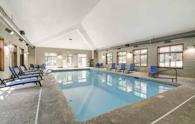 Indoor swimming pool with lounge chairs at Southwind Villas in southwest Omaha in La Vista, NE, 68128