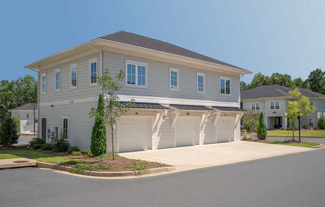 A two-story house with a garage on the first floor.