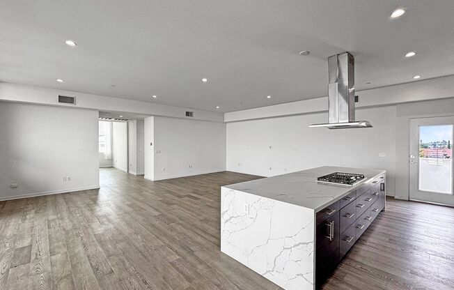 Modern 2BD/2BA Condo in North Park W/ High Ceilings, W/D & Reserved Garage Parking!