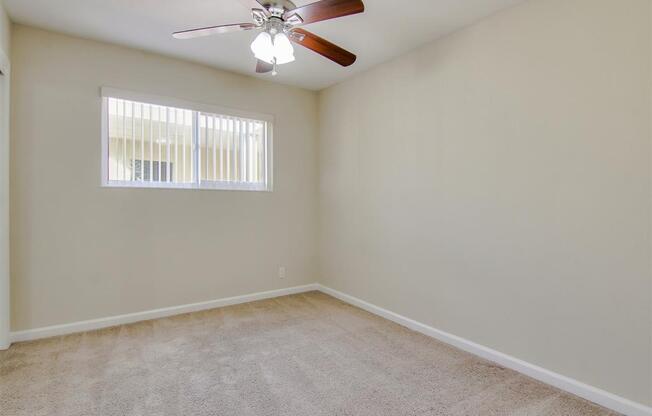 Ceiling Fan In Bedroom at Magnolia Place Apartments, California