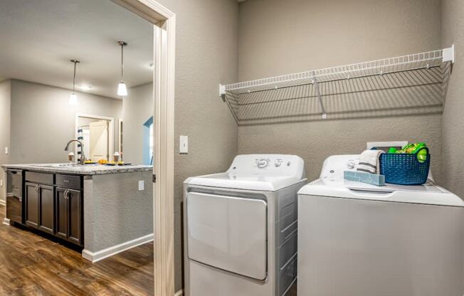 Washer and dryer in a closet at the Flats at Sundown