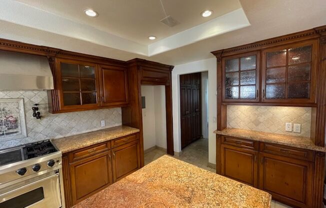 Spacious 4 Bedroom Oxnard Home with Custom Kitchen and More