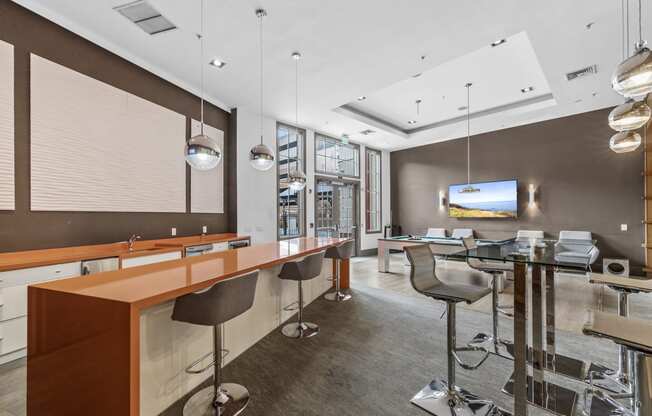 a room filled with furniture and a flat screen tv at Harbor Pointe, New Jersey