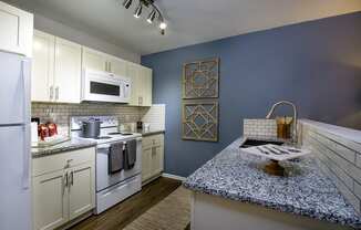 Subway Tile Backsplash and Granite Countertops