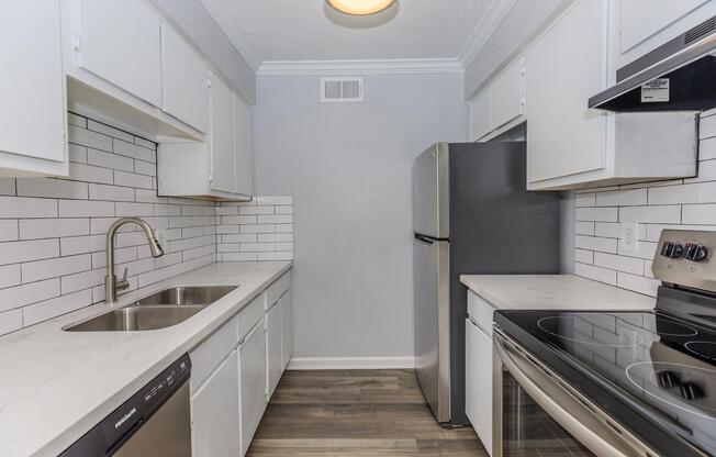 a kitchen with a stove top oven