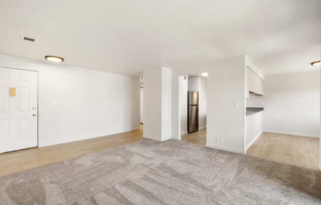 a living room with white walls and taupe carpet  at Brix, Washington, 99362