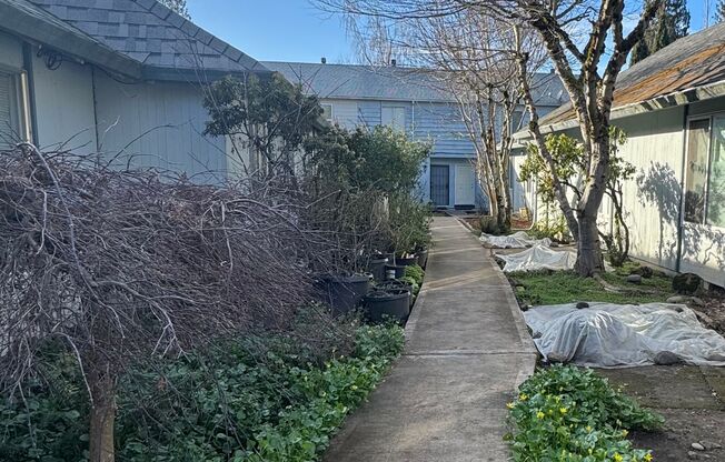 Charming Remodeled Townhome in Raleigh West - Prime Location w/ Garage & Private Patio