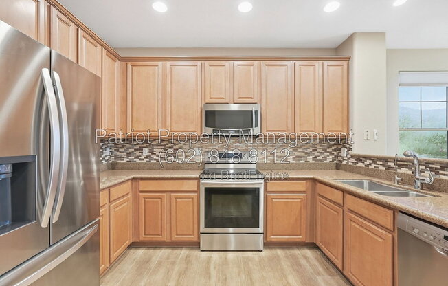 11599 E RAINTREE DR