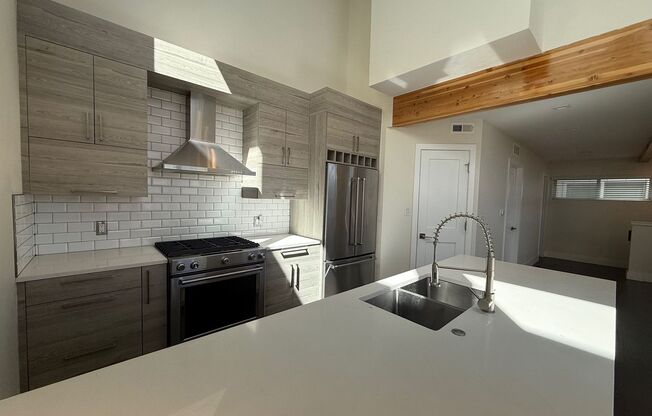 Modern End Unit Townhome with Rooftop Oasis | 2 Bedrooms, 2.5 Baths | Prime Location