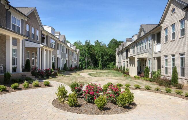 Beautiful John Wieland end unit townhouse never lived in, located in the heart of Waverly.