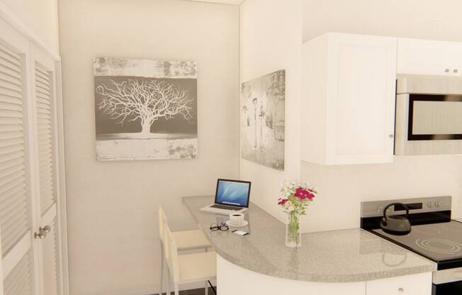a kitchen with a desk and a microwave at Brownstones at Palisade Park, Broomfield Colorado