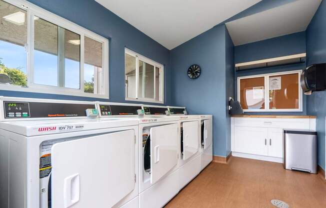 A laundry room with a washer and dryer.
