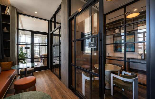 a room filled with furniture and a large window