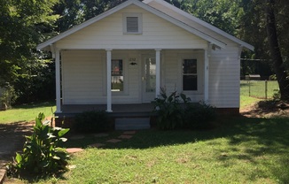 Adorable 2BR Home with Rocking Chair Front Porch