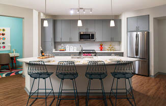 Kitchen with island  | District at Rosemary