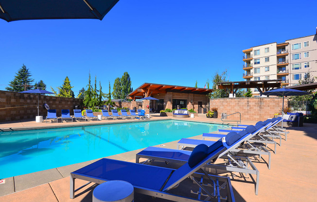 Swimming Pool With Relaxing Sundecks at The Pacifica Apartments, Tacoma, Washington