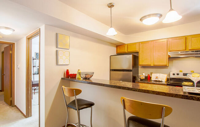 Apartment kitchen with Breakfast Bar