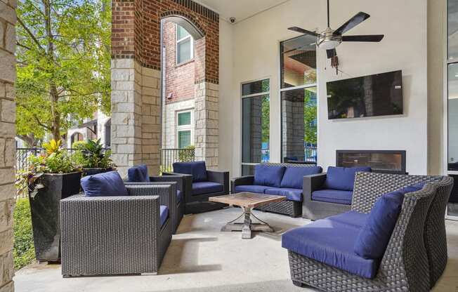 the preserve at ballantyne commons outdoor living area with furniture and a ceiling fan