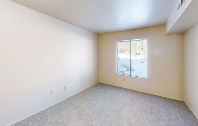 bedroom with a large window