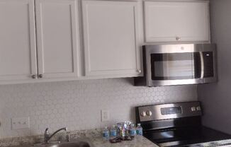 3001 Avenue C C Studio is behind duplex