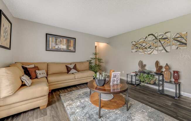 a living room with couches and a coffee table at Desert Bay Apartments, Laughlin, Nevada