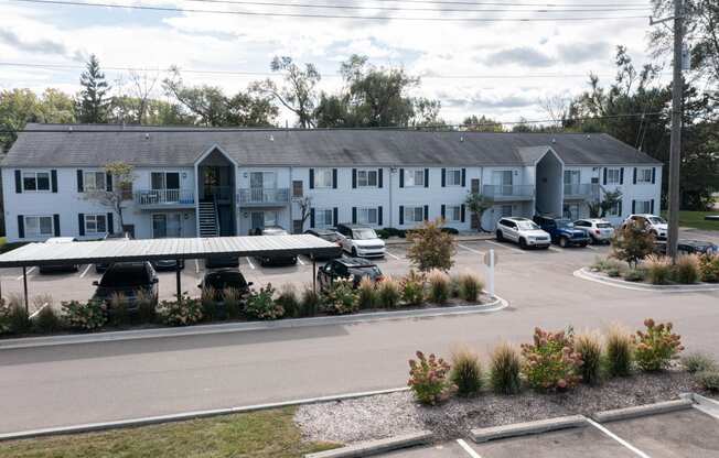 apartment parking lot with covered parking