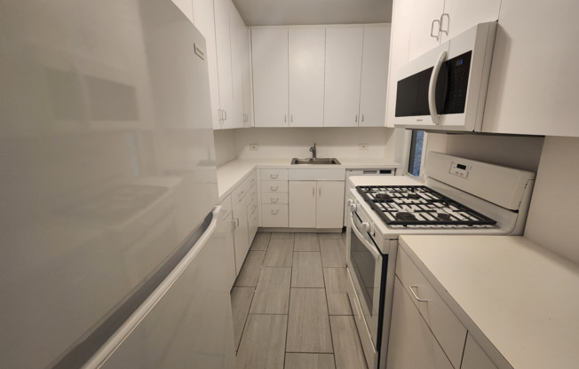 2 beds, 2 baths, 1,240 sqft, $8,275, Unit 5F