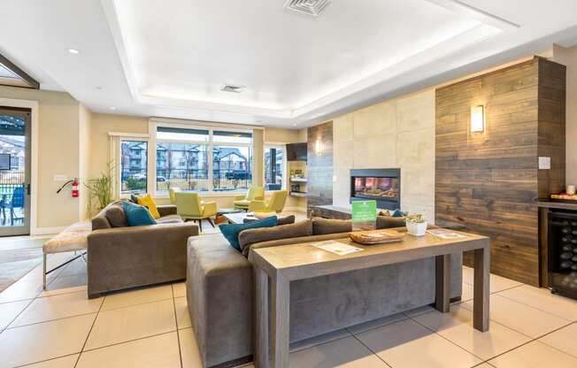 a living room with couches and chairs and a table