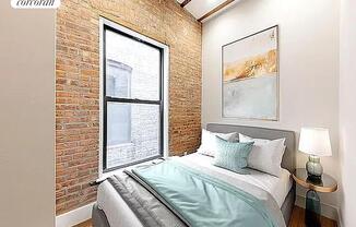266 W 25 ST
