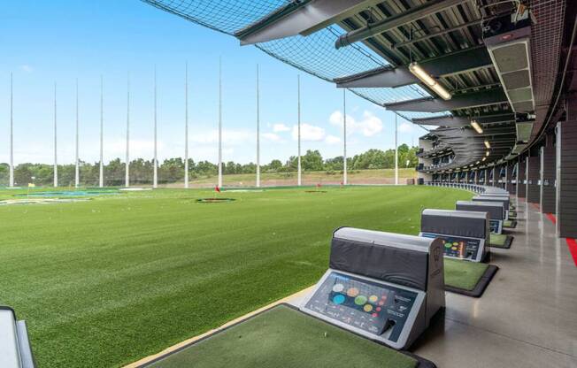 a view of the field from the dugout of a baseball stadium