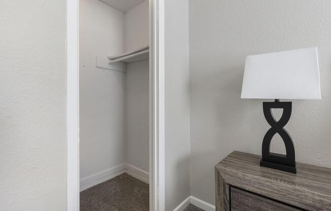 a bedroom with a large mirror