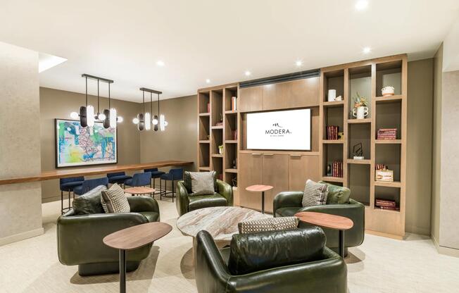 A coworking lounge, complemented by a private conference room and two private offices, offers residents a versatile workspace within the community.