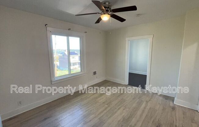 122 E 16 AVE