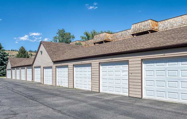 a row of garage doors on the side of a building