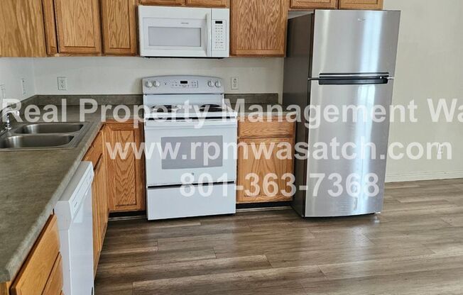 Come See This 3 Bedroom 2.5 Bathroom Town Home in West Valley City
