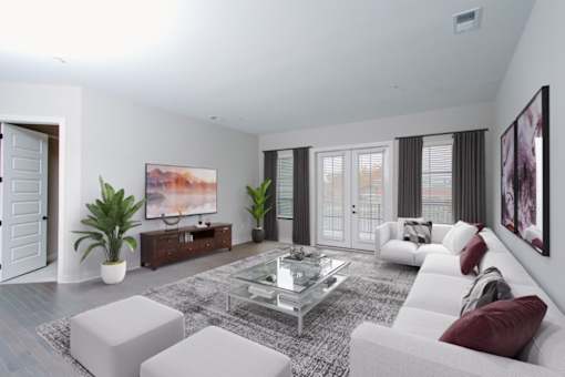 a living room with white furniture and a glass coffee table at Fairfax, Grandview, OH