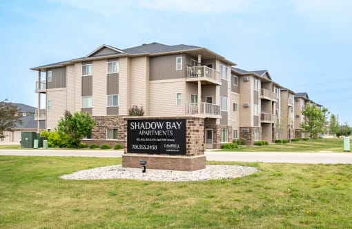 an image of the shadow bay apartments sign