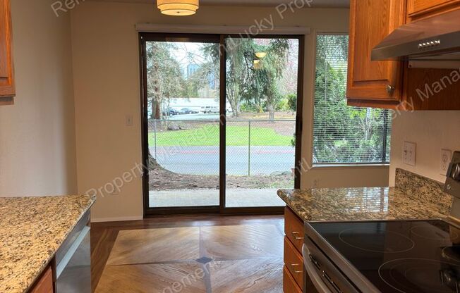 Cozy Kirkland Condo! 1 Bed, 1 Bath w/ Updated Kitchen and Additional Parking!