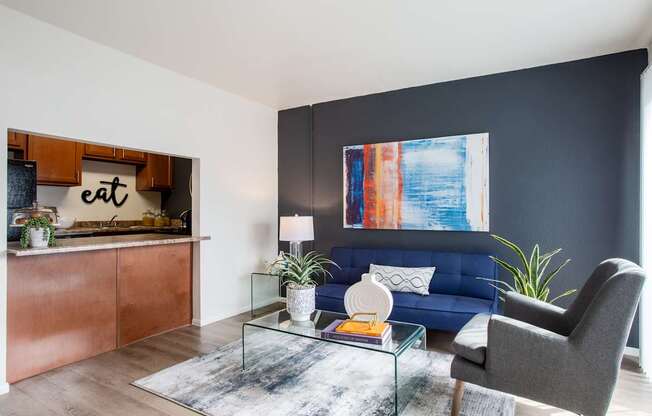 Tucson, AZ Apartments – Midtown on Seneca – Photo of Furnished Living Room with Woodstyle Flooring