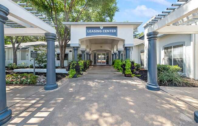 Exterior Leasing Center & Landscape at Allure North Dallas Apartments in Dallas, TX.