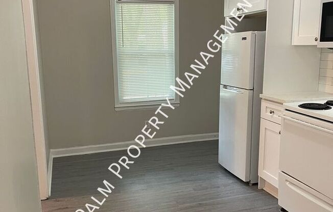1323 E 55 ST