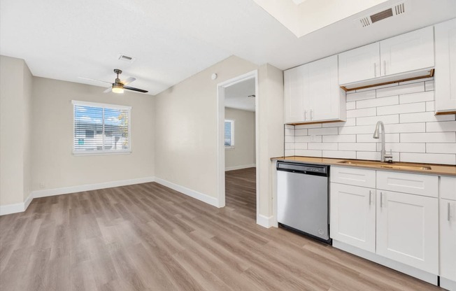 a kitchen and living room in a 555 waverly unit