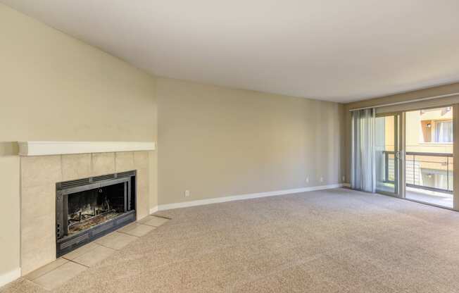 Vacant Kelsey and Mercer Spacious Living Room with fireplace in select homes. 