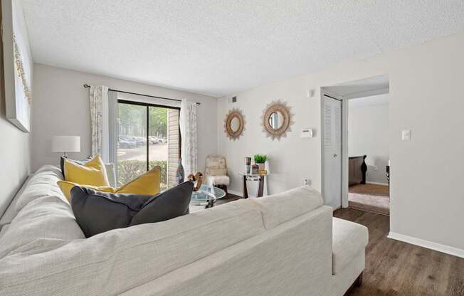 Spacious Living Area With Wood-Style Flooring