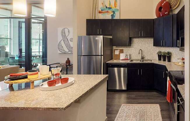 Fully Equipped Kitchen With Modern Appliances at Civic at Frisco Square Apartments, Texas